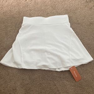 White tennis skirt